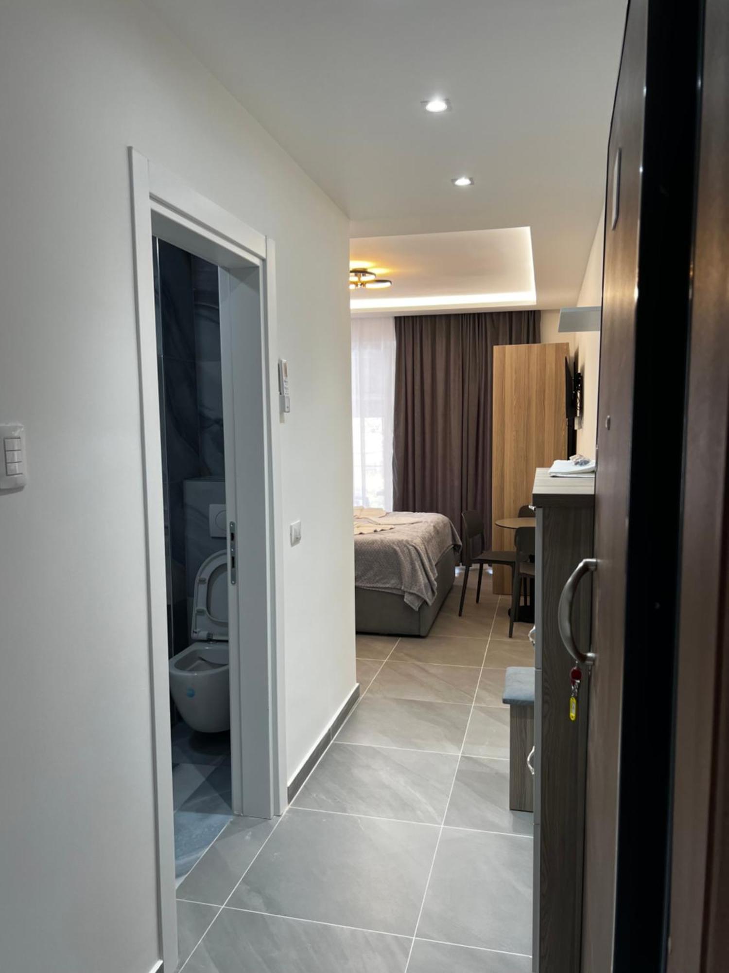 D&D Hotel Shengjin Bagian luar foto