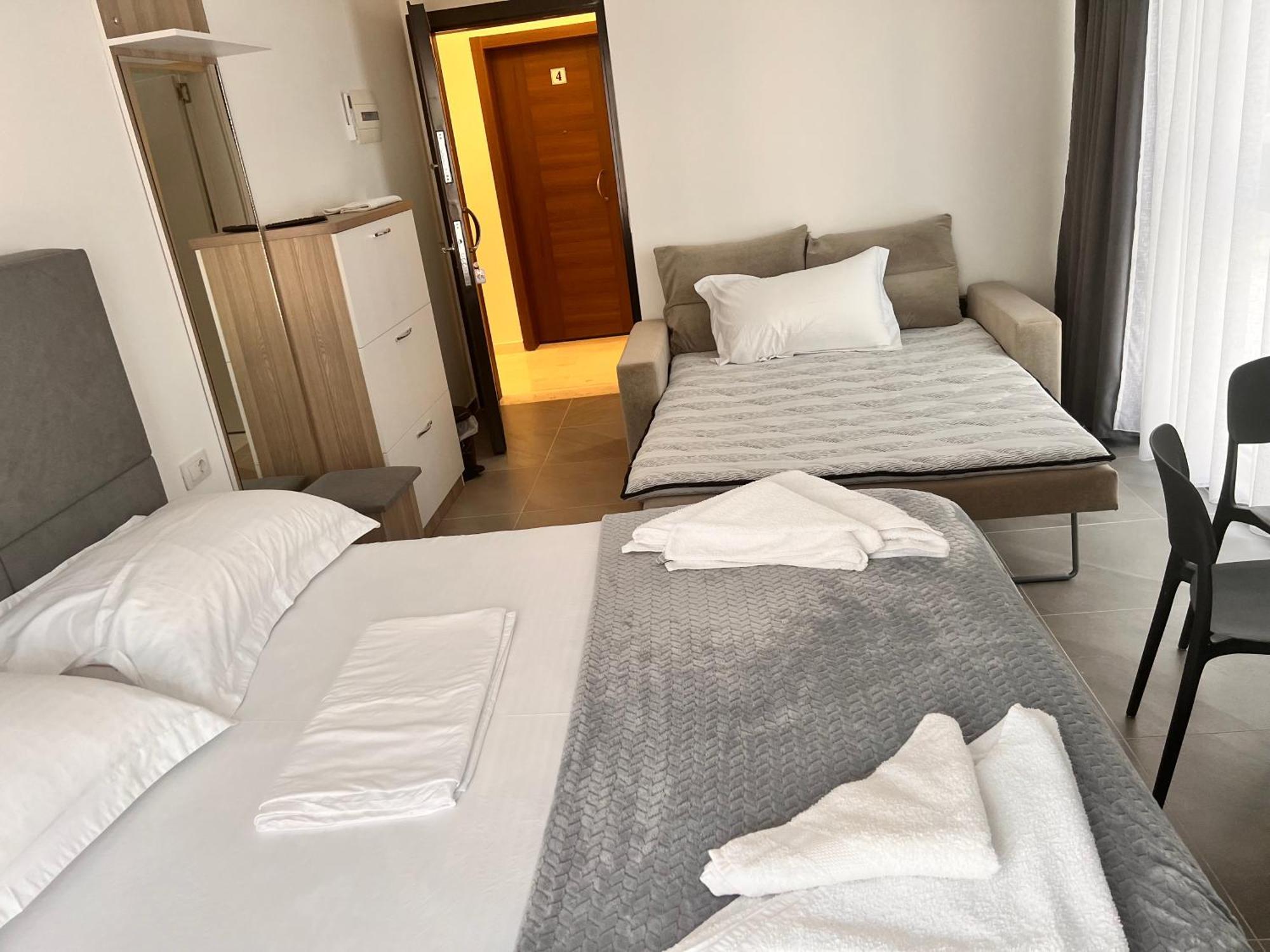 D&D Hotel Shengjin Bagian luar foto